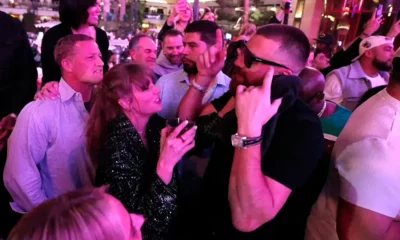 Taylor Swift and Travis Kelce dance together during Bleachers performance at Coachella 2024
