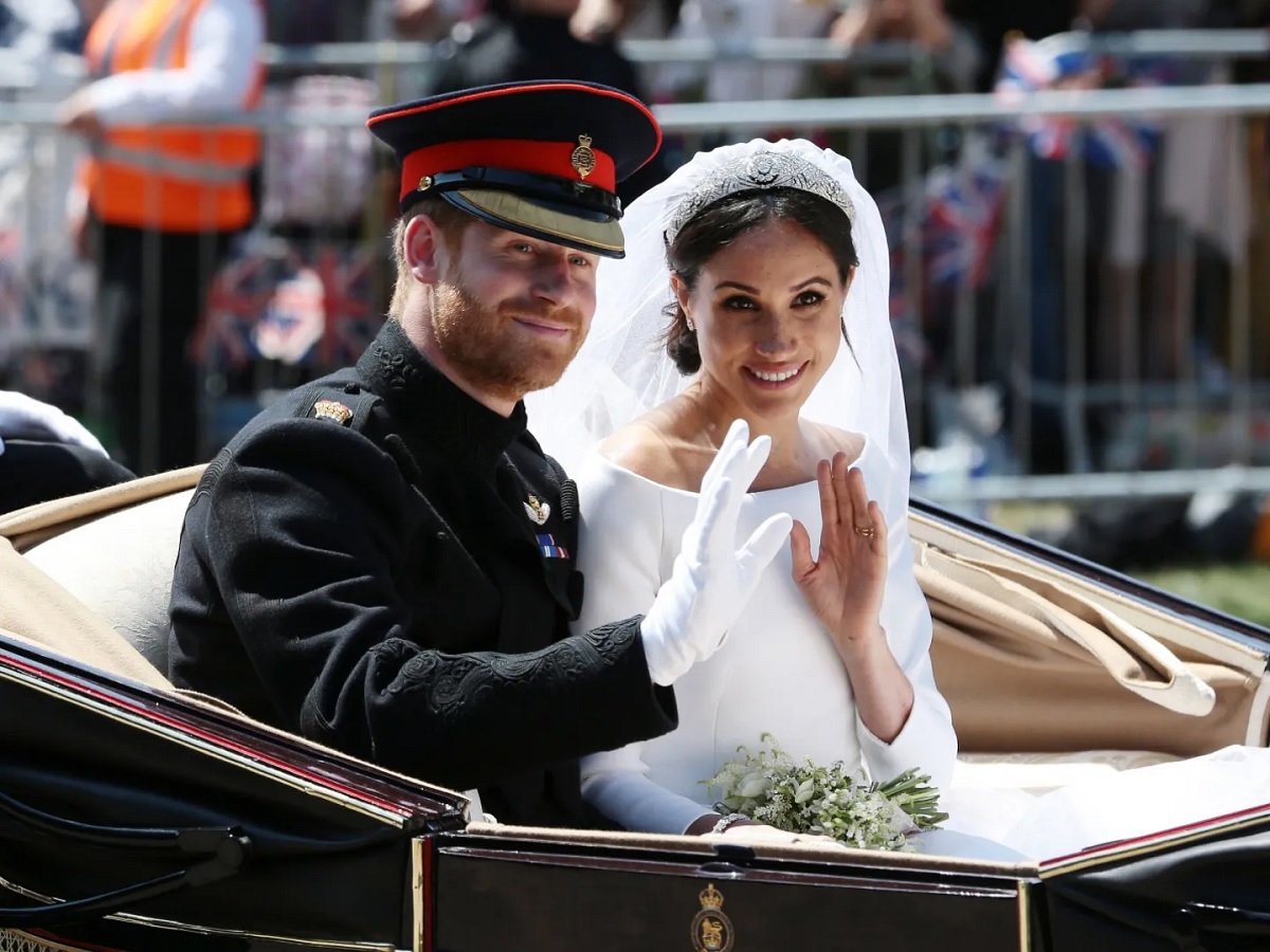 Royal photographer Arthur Edwards describes Prince Harry and Meghan Markle’s wedding as a ‘miserable’ day.