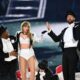Do you think Kim Kardashian is correct or jealous? She claimed that Taylor Swift's decision to bring Travis Kelce onstage is utter nonsense, reckless, and irresponsible, and that Swift will regret it.