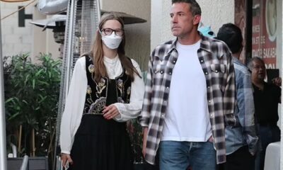 Why is Ben Affleck seen without his wedding ring during lunch with his daughter Violet, while Jennifer Lopez is vacationing in Italy?