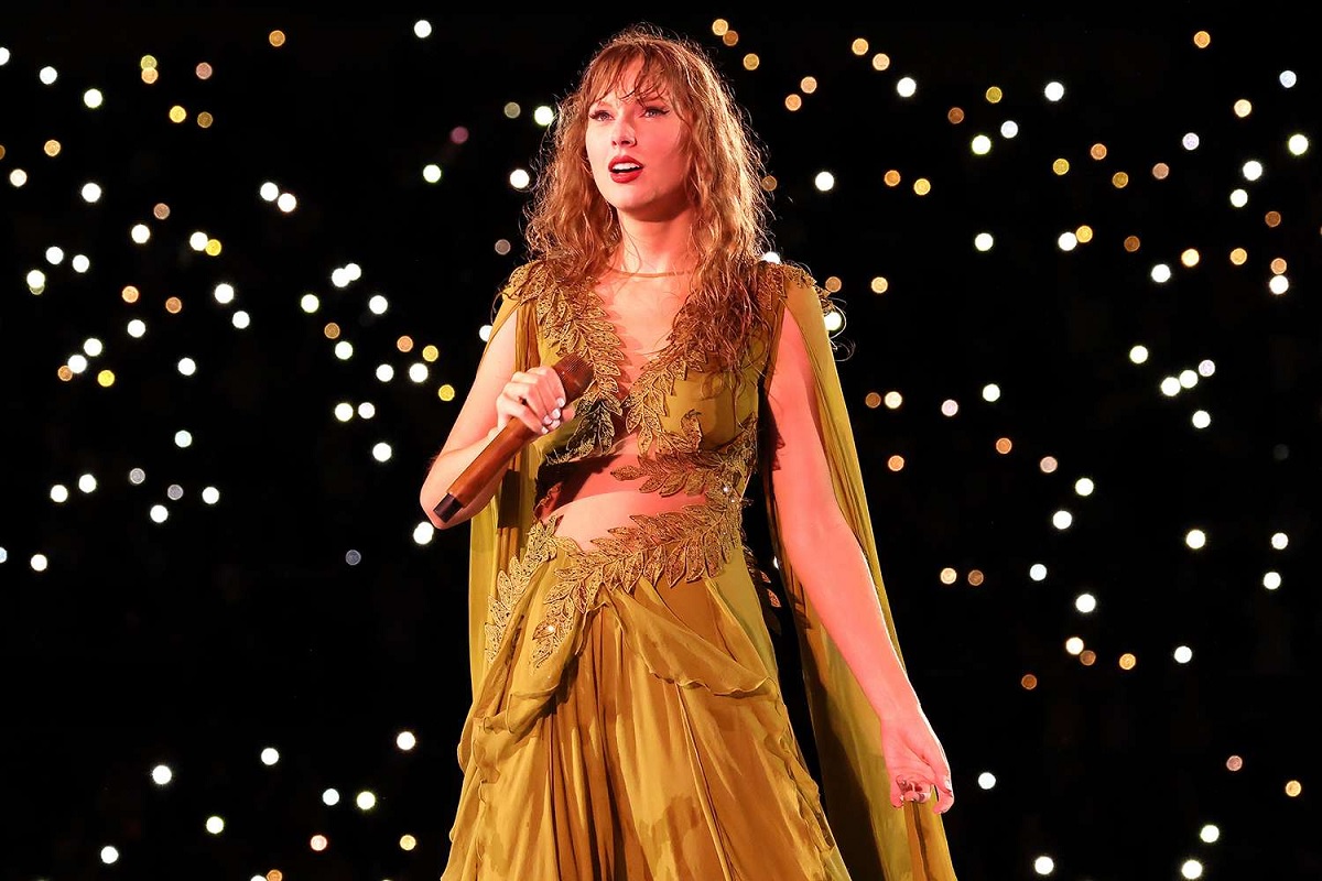 At a recent Eras Tour show in Lyon, Taylor Swift enthusiastically extends her wishes to fans for a 'Happy Pride Month'.