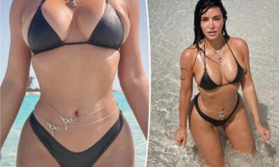 Kim Kardashian shows off curves in bikini and body chains: ‘Built like a trophy’