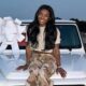 Simone Biles Stuns on Hood of Sparkling White G-Wagon: ‘In with the New, Out with the Old’—See the Glamorous New Ride!"